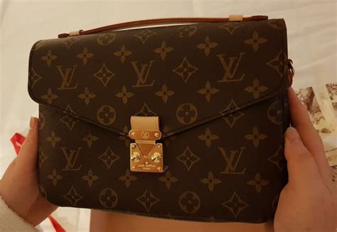 cartera louis vuitton original sello|bolso de louis vuitton original.